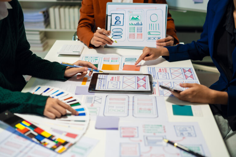 UX developer and ui designer brainstorming about mobile app inte